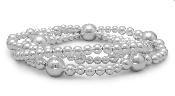 Elegant silver beaded bracelet with multiple strands.
