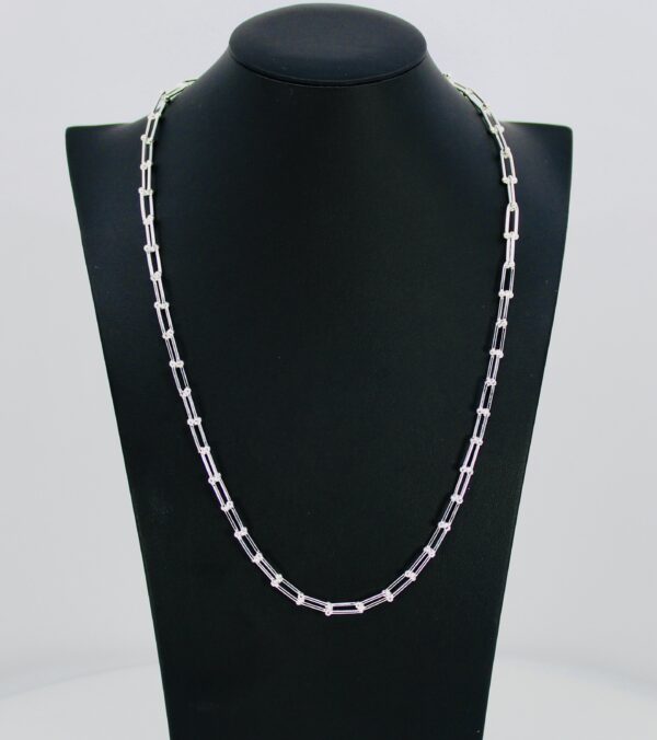 Silver elongated-link chain necklace on black bust